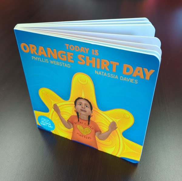 A copy of "Today is Orange Shirt Day" by Phyllis Webstad and illustrated by Natassia Davies